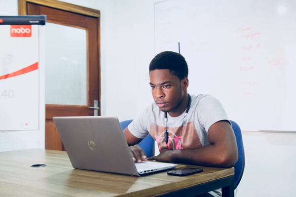 A learner uses a laptop.